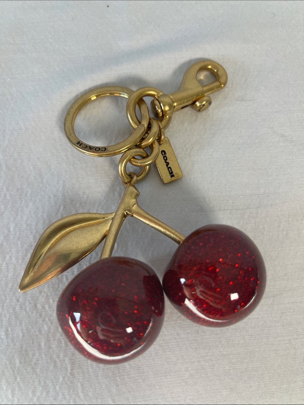 Coach 77840 Cherry Bag Charm Red Glitter Brass Keychain